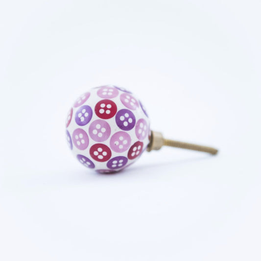 pink and purples button door knob