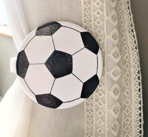 Childrens wooden football curtain tie backs