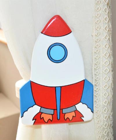 childrens wooden space rocket curtain tie backs